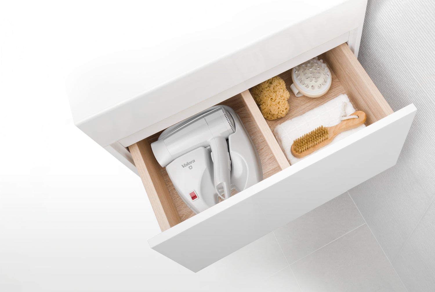 Drawer-mounted pistol-grip professional hairdryers